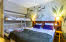 Photo by: Karl Gabor Bed and wall bed in Family room